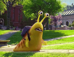 A Cartoon Snail With Big Eyes Is Walking Down A Sidewalk In A Park GIF