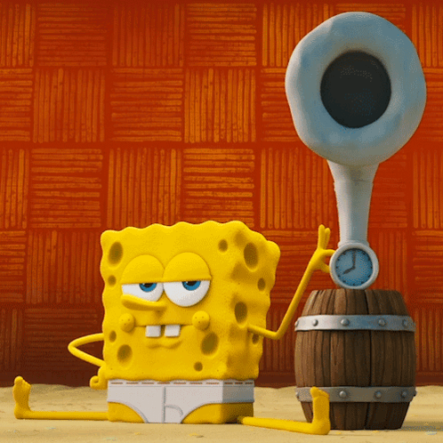A Cartoon Spongebob Is Sitting Next To A Barrel And A Clock GIF