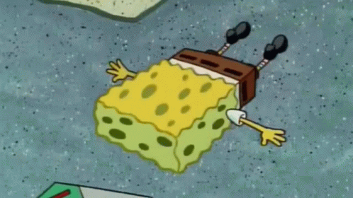 A Cartoon Spongebob Squarepants Character Is Laying On His Back On The Ground GIF