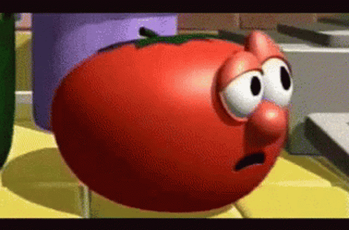 A Cartoon Tomato With Big Eyes And A Big Nose GIF