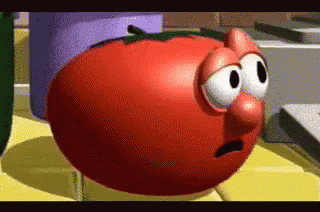 A Cartoon Tomato With Big Eyes And A Big Nose GIF