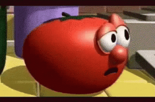 A Cartoon Tomato With Big Eyes And A Nose GIF