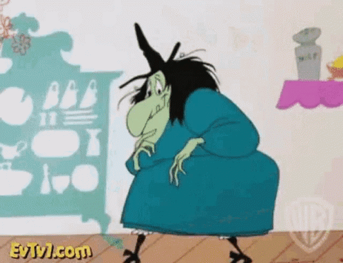 A Cartoon Witch In A Blue Dress Is Standing In Front Of A Shelf . GIF
