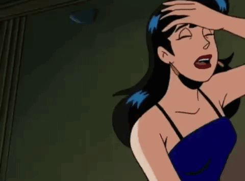 A Cartoon Woman Is Laying On The Floor With Her Mouth Open And Her Eyes Closed . GIF