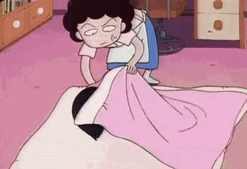 A Cartoon Woman Is Making A Bed With A Pink Blanket . GIF