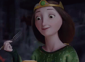A Cartoon Woman With A Crown On Her Head Is Holding A Fork And A Plate Of Food . GIF