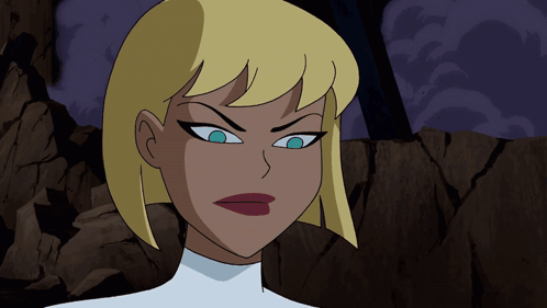 A Cartoon Woman With Blonde Hair And Blue Eyes GIF