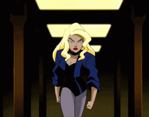 A Cartoon Woman With Blonde Hair And Blue Eyes Is Wearing A Blue Shirt GIF