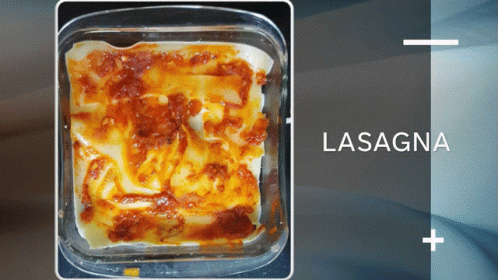 A Casserole Dish With Lasagna Written On The Top GIF