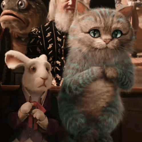 A Cat And A Rabbit Are Standing Next To Each Other In Front Of A Fish GIF