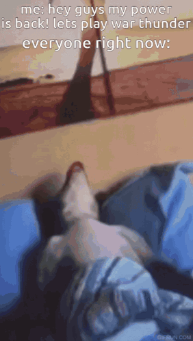 A Cat Is Laying On A Bed With A Caption That Says Hey Guys My Power Is Back Lets Play War Thunder Everyone Right Now . GIF