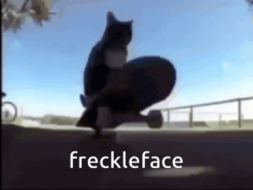 A Cat Is Riding A Skateboard With The Words Freckleface Written Below It GIF