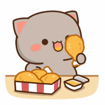 A Cat Is Sitting At A Table Eating Fried Chicken GIF