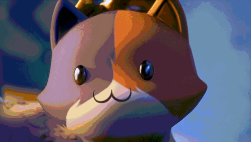 A Cat With A Crown On Its Head Is Looking At The Camera GIF