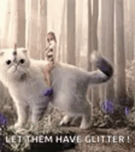 Cat With Unicorn Horn In Forest GIF