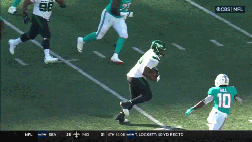 A Cbs Nfl Broadcast Of A Football Game Between The New York Jets And The Miami Dolphins GIF