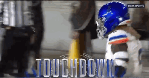 A Cbs Sports Ad Shows A Football Player Getting Ready To Touch Down GIF