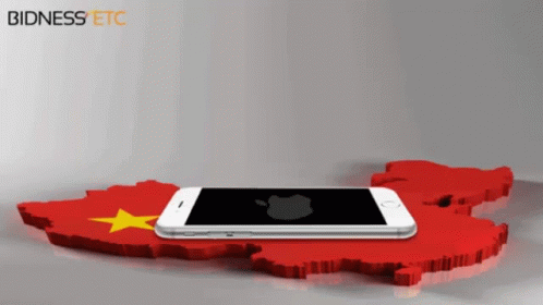 A Cell Phone Laying On Top Of A Red And Yellow Map With Bidness Etc Written On The Bottom GIF