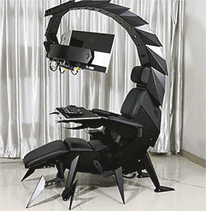A Chair That Looks Like A Scorpion With A Computer On Top GIF
