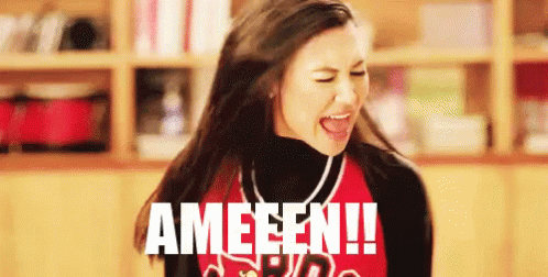 A Cheerleader With The Word Ameen Written On Her Face GIF