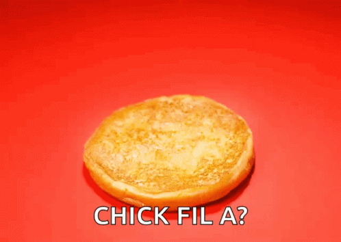 A Chick Fil A Sandwich Is On A Red Background GIF