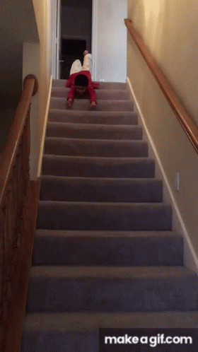 A Child Is Crawling Up A Set Of Stairs With Make A Gif.com In The Bottom Right Corner GIF