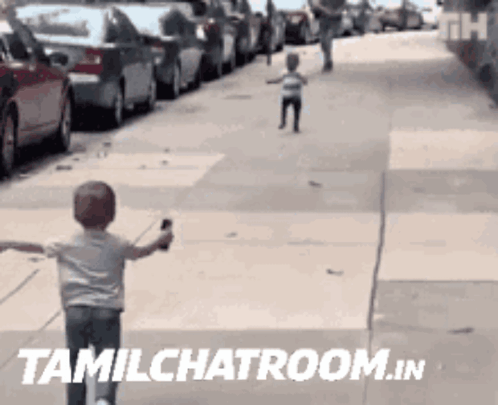 a child is running down a sidewalk with the words tamilchatroom.in written on the bottom