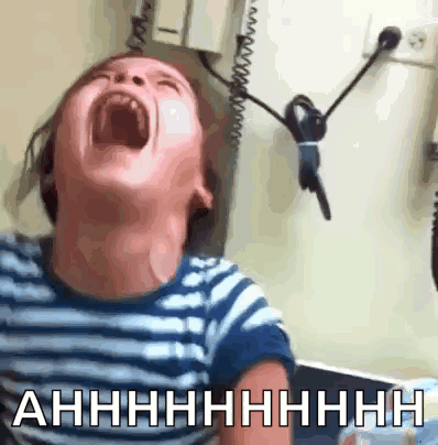 A Child Is Screaming With The Words Ahhhh Written On The Bottom Of The Image GIF