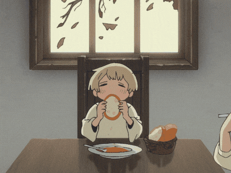 A Child Is Sitting At A Table With A Plate Of Food And A Basket Of Bread GIF
