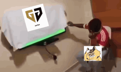 A Child Sitting In Front Of A Television With A Gp Logo On It GIF