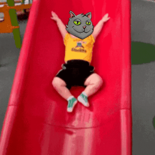 A Child Wearing A Yellow Shirt That Says Steelers Is Going Down A Slide GIF