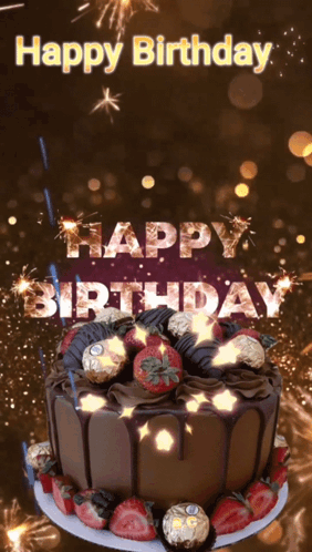A Chocolate Birthday Cake With Strawberries And Fireworks With The Words Happy Birthday GIF
