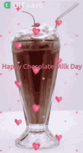 A Chocolate Milkshake With Whipped Cream And A Cherry In It GIF