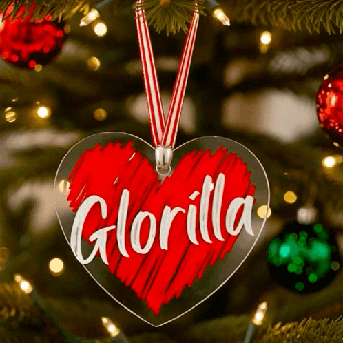 A Christmas Ornament With The Name Glorilla On It GIF