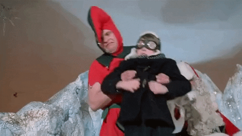 A Christmas Story Elves Throw Ralphie To Slide GIF