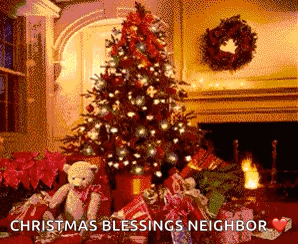 A Christmas Tree Is Sitting In Front Of A Fireplace Surrounded By Presents And A Teddy Bear . GIF