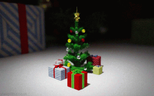 A Christmas Tree With Presents Underneath It And A Sheepfilms.co.uk Logo GIF