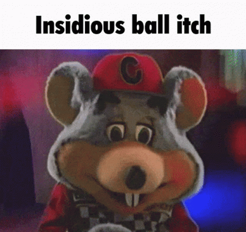A Chuck E Cheese Mascot With The Words Insidious Ball Itch GIF