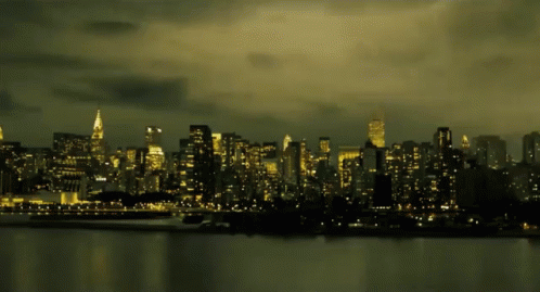 A City Skyline With The Empire State Building In The Distance GIF