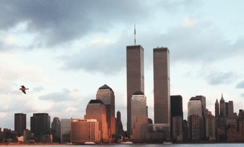 A City Skyline With The Twin Towers In The Middle GIF