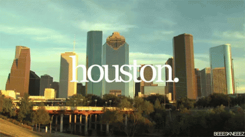A City Skyline With The Word Houston In White GIF