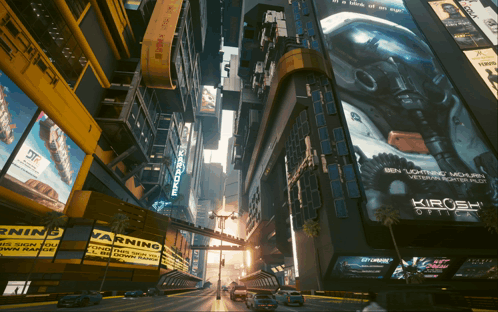 A City Street With A Warning Sign In The Middle Of It GIF