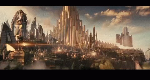 Cityscape With Tall Buildings And Cloudy Sky GIF
