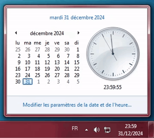 A Clock Displays The Time Of 23:59 On December 31St GIF