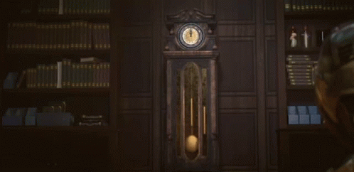 A Clock With Roman Numerals On The Face Shows The Time As 4:20 GIF
