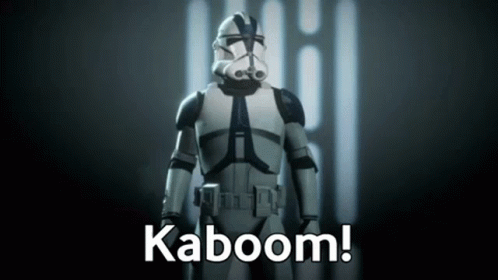 A Clone Trooper From Star Wars Is Standing In Front Of A Wall With The Words Kaboom Written On It . GIF