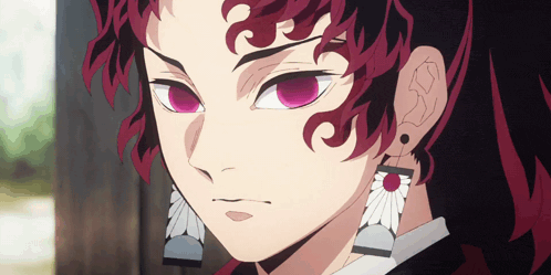 A Close Up Of A Anime Character With Red Eyes GIF