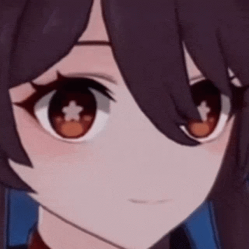 A Close Up Of A Anime Girl 'S Face With A Star In Her Eyes . GIF