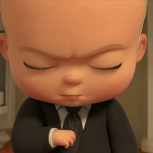 A Close Up Of A Baby In A Suit With His Eyes Closed GIF