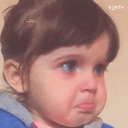 A Close Up Of A Baby 'S Face With Ejmtv Written On The Bottom Right GIF